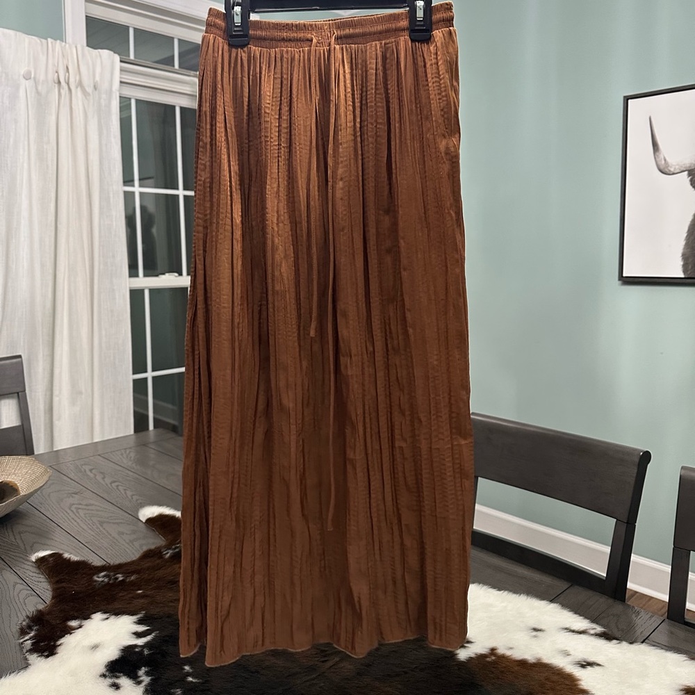 The brand is Wishlist Apparel, more like a dark camel color